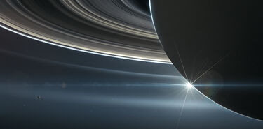 El origen de los anillos de Saturno est en el choque reciente de dos lunas 